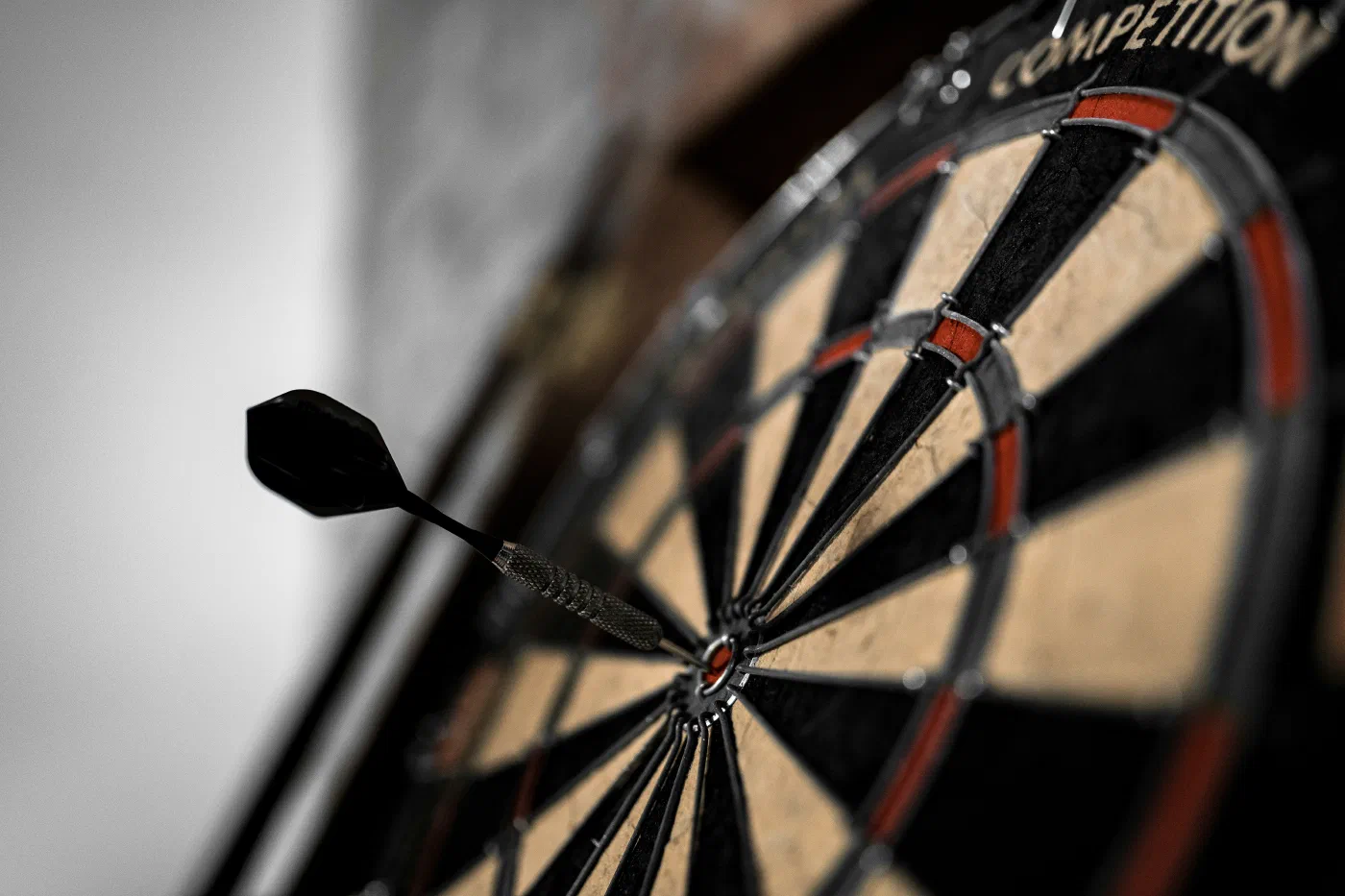 A black and brown dartboard